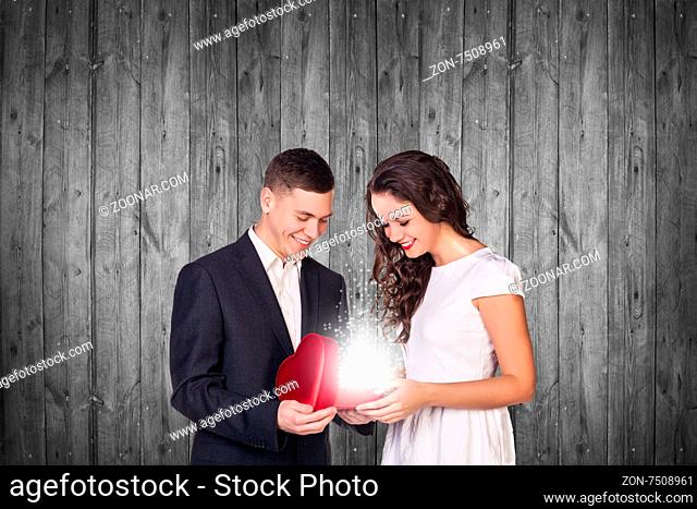 Beautiful man and woman on gray background
