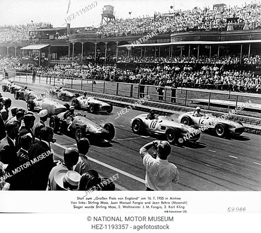 Start of the British Grand Prix, Aintree, Liverpool, 1955. From left to right on the front row are Jean Behra (Maserati)