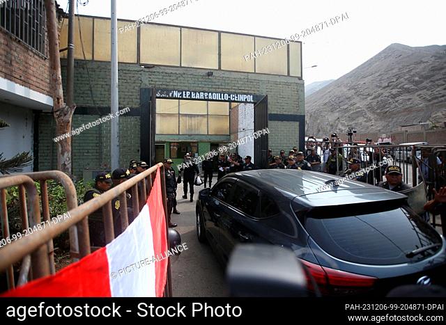 06 December 2023, Peru, Lima: Security forces stand in front of the prison where former Peruvian President Fujimori is said to be held