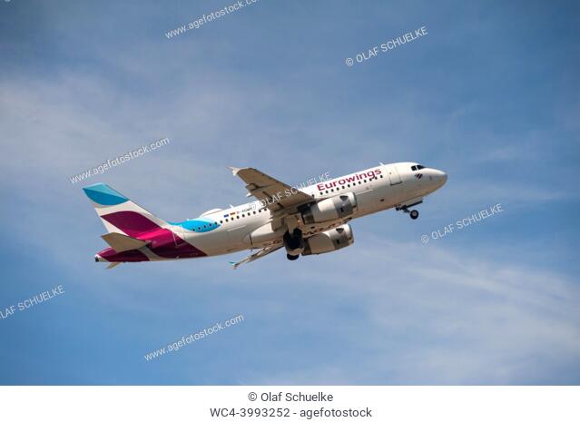 Berlin, Germany, Europe - A Eurowings Airbus A319 passenger aircraft with the registration D-AGWM takes off from Berlin Brandenburg Airport BER