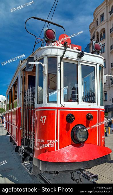 ISTANBUL, TURKEY - MAY 05, 2014: The Istanbul nostalgic red tramways heritage red vintage electric, Taksim Istiklal Street is a popular destination