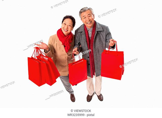 Elderly couple shopping in the New Year