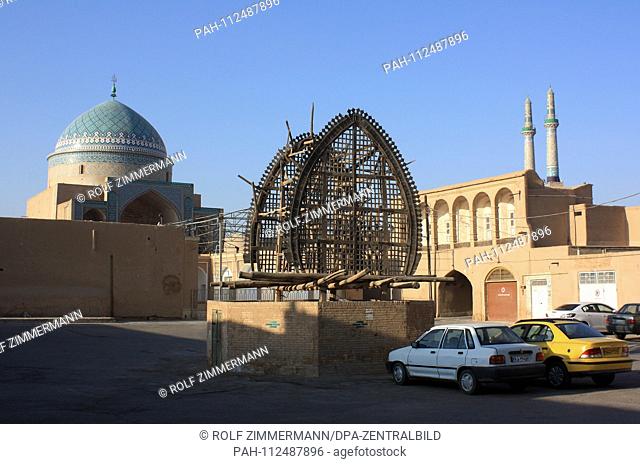 Iran - Yazd, also Jasd, is one of the oldest cities of Iran and capital of the province of the same name. The wood skeleton symbolizes a palm frond for the...
