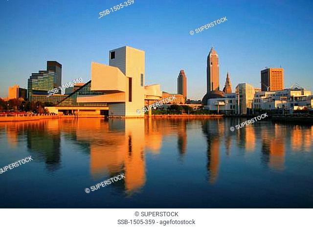 Reflection of buildings in a lake, Lake Erie, Rock and Roll Hall of Fame and Museum, Downtown Cleveland, Cleveland, Ohio, USA