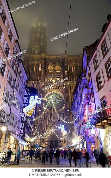 France, Bas Rhin, Strasbourg, old town listed as World Heritage by UNESCO, Christmas decoration, Rue Merciere and Notre Dame Cathedral