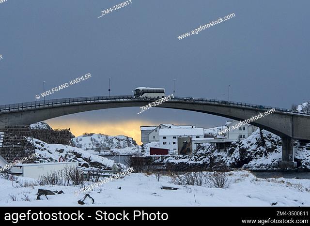 Winter scene with the view of the bridge connecting the village of Henningsvaer, a small fishing village near Svolvaer, in the Lofoten Islands, Nordland County