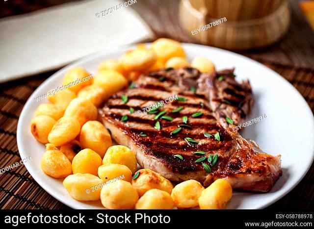 Grilled Beefsteak with Baby Roasted Potatoes. High quality photo