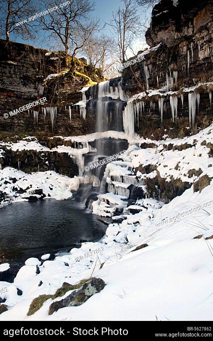 View of partially frozen waterfall with icicles, Uldale Force, River Rawthey, Baugh Fell, Howgill Fells, Cumbria, England, United Kingdom, Europe