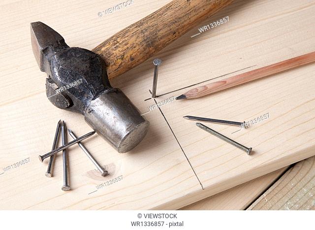 Still life of hammer nails