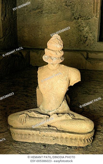 Statue of Akshobhya worship in cave number six in Panhale Kazi caves ; Konkan ; Maharashtra ; India