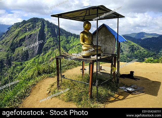 Buddha statue in the Little Adamâ. . s Peak in Ella, Sri Lanka