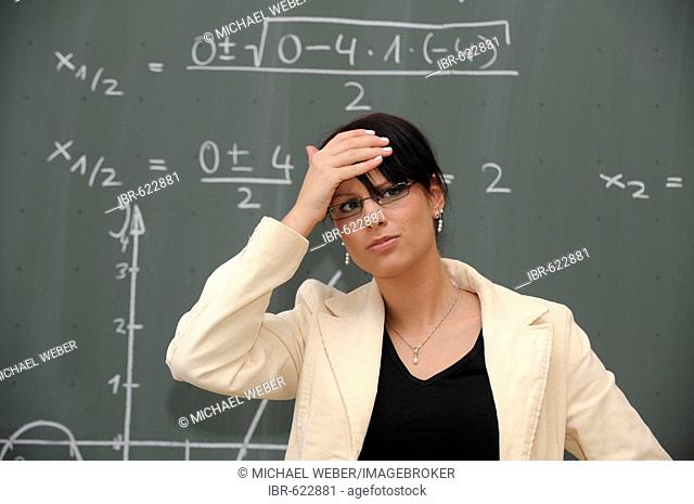 Young female teacher stressed out