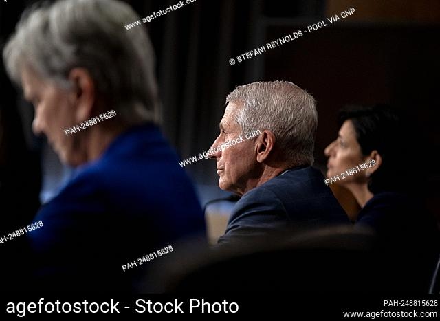 Dr. Anthony Fauci, director of the National Institute of Allergy and Infectious Diseases, center, speaks during a Senate Health, Education, Labor