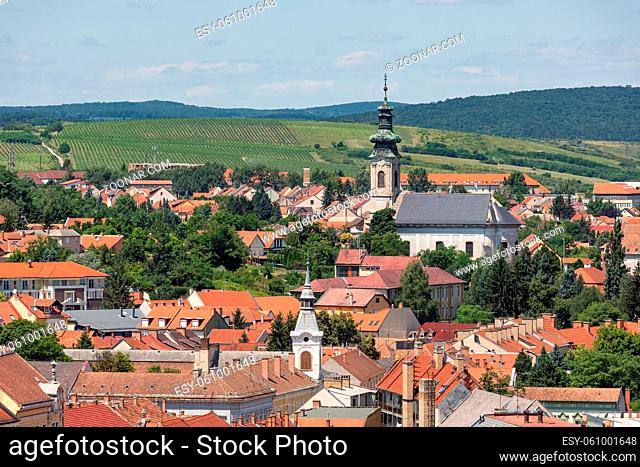 Aerial view Eger, Hungarian Country town with church and vineyards around the city