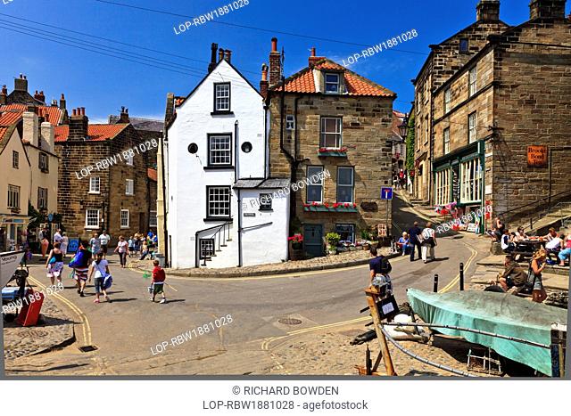 England, North Yorkshire, Robin Hood's Bay. Tourists in the centre of Robin Hood's Bay, the busiest smuggling community on the Yorkshire coast during the 18th...