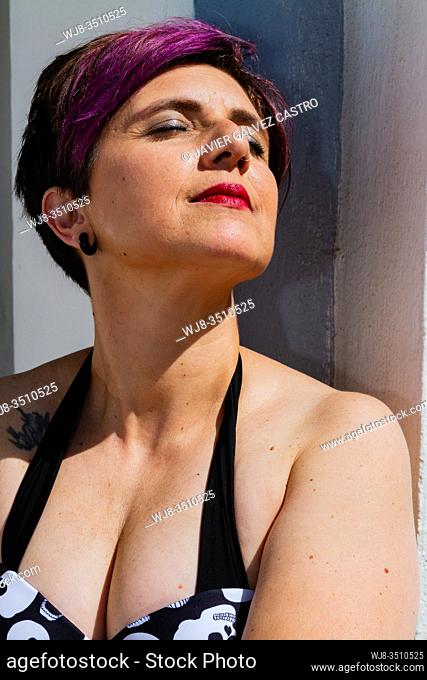 Pretty woman portrait enjoy sunbath
