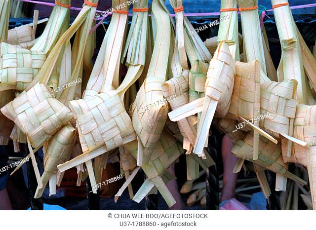 Rice dumpling called 'Ketupat' in Malay's words for sale. Image taken taken in front of Kuching State mosque, Sarawak, Malaysia