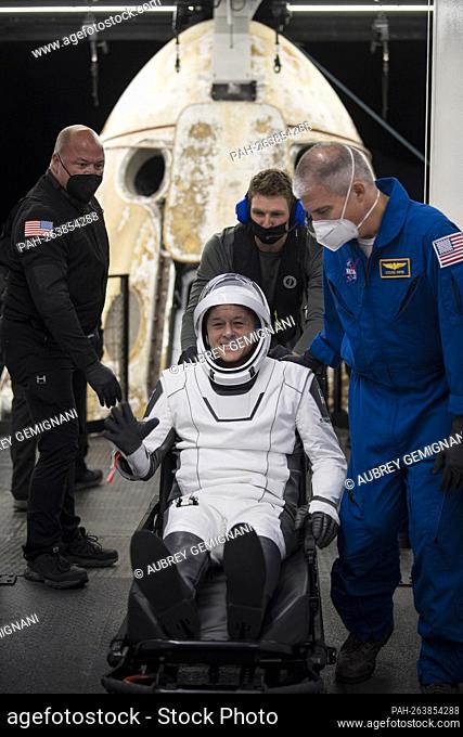 NASA astronaut Shane Kimbrough is seen after being helped out of the SpaceX Crew Dragon Endeavour spacecraft onboard the SpaceX GO Navigator recovery ship after...