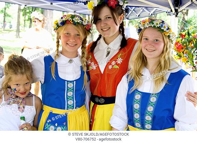 Four girls in traditional Swedish costumes  Svenskarnas Dag Swedish Heritage Day Minnehaha Park Minneapolis Minnesota USA