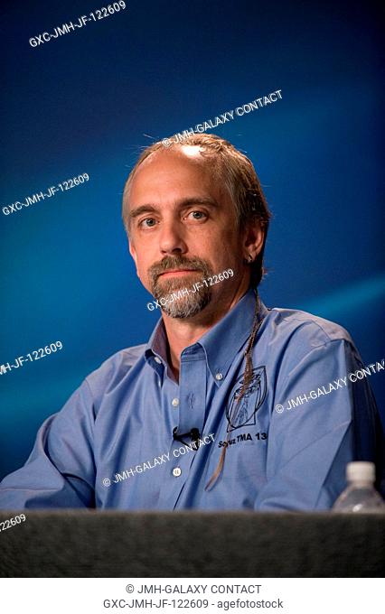American spaceflight participant Richard Garriott fields a question from a reporter during an Expedition 18Soyuz 17 pre-flight press conference at NASA's...