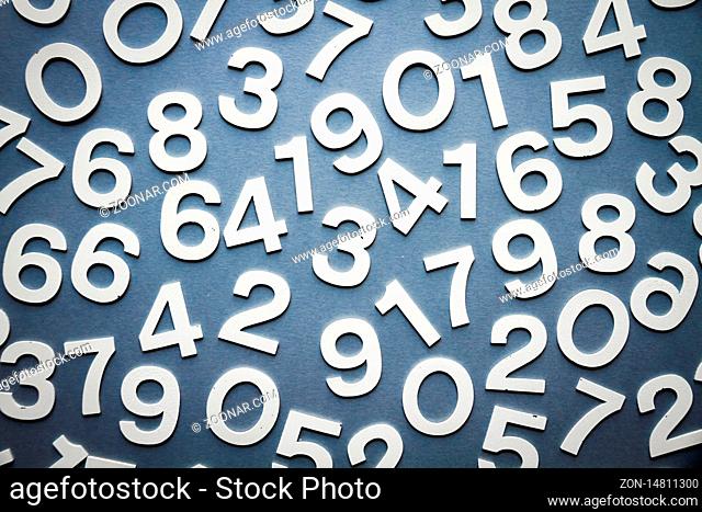 Mathematics background made with solid numbers on a board