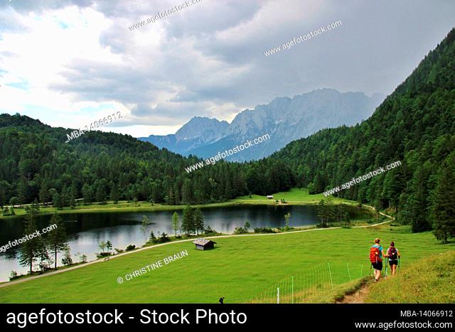 morning mood at ferchensee, two hikers, hikers, lake, germany, upper bavaria, werdenfelser land, mittenwald, cloud mood in front of the karwendel
