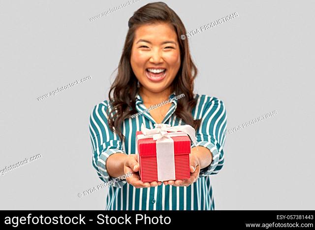 happy asian woman with birthday present