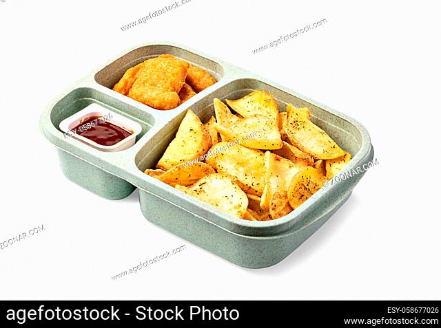 Tasty fried nuggets and potatoes isolated on white background