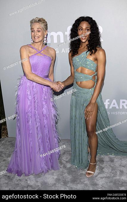Sharon Stone (l) and Michaela Jaé Rodriguez attend the amfAR Gala during the 74th Cannes Film Festival at Villa Eilenroc in Antibes, France, on 16 July 2021