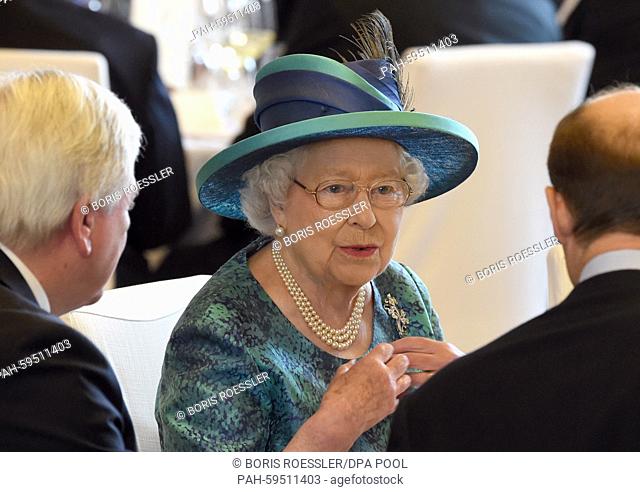 Britain's Queen Elizabeth II attends a luncheon at the Roemer City Hall in Frankfurt am Main, Germany, 25 June 2015. The British monarch and her husband are on...