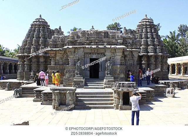 Frontal view of temple, showcasing stellate design towers, ornamented, detailed stone carvings, at Chennakesava Temple, Hoysala Architecture, Somanathpur
