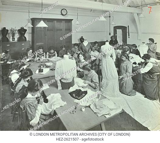 Dressmaking class, Hammersmith Trade School for Girls, London, 1911. Artist: Unknown