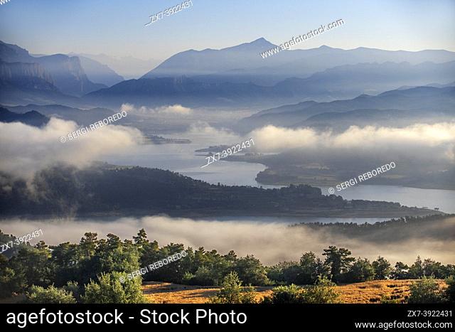 Fog around the small town of La Clua in Basella Lleida, with 18 inhabitants in the Rialb Reservoir, Catalonia. Spain.