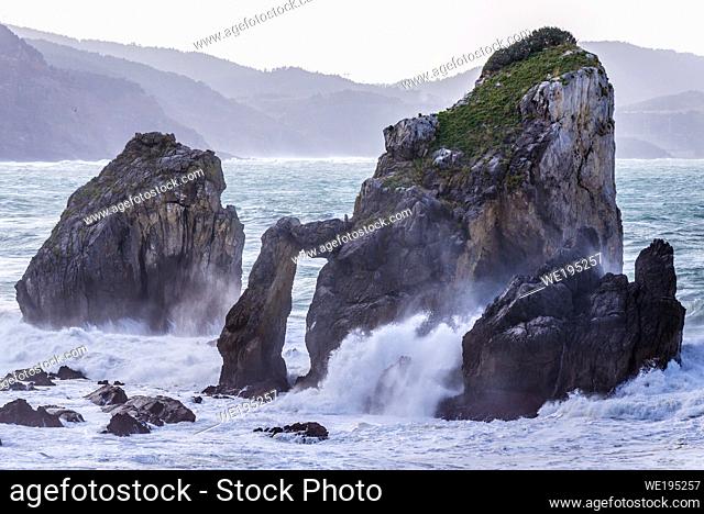 Rocks around Gaztelugatxe islet in on the coast of Biscay province of Spain