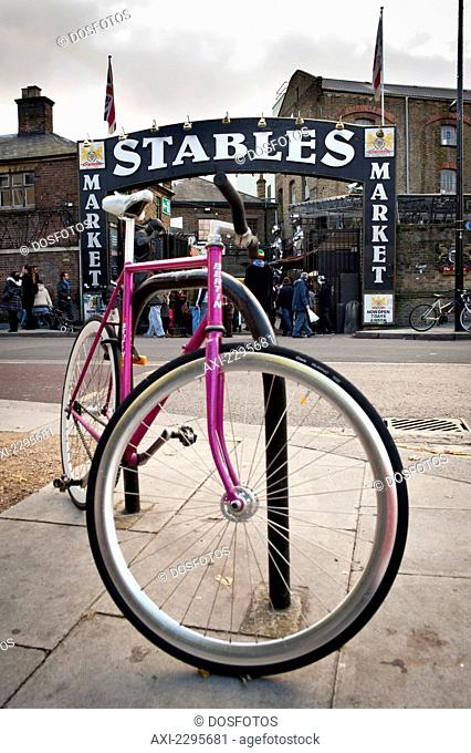 Pink Bicycle Parked In Front Og The Stables In Camden Market, North London, London, Uk