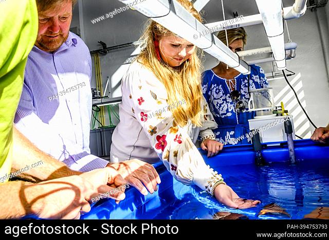 King Willem-Alexander, Queen Maxima and Princess Amalia of The Netherlands at the RAAK PRO Diadema project in Fort Bay, on February 09, 2023