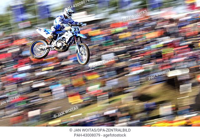 Estonian motocross racer Tanel Leok (TM) jumps a hill during the warm-up at the Motocross of Nations (MXoN) in Teutschenthal, Germany, 29 September 2013