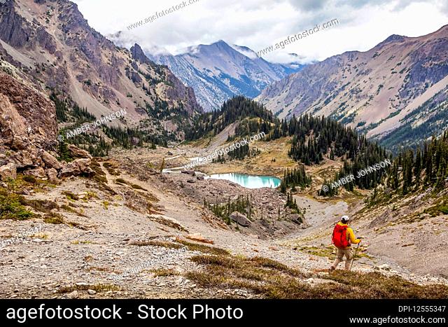 Male hiker in Royal Basin, Olympic Mountains, Olympic National Park; Washington, United States of America