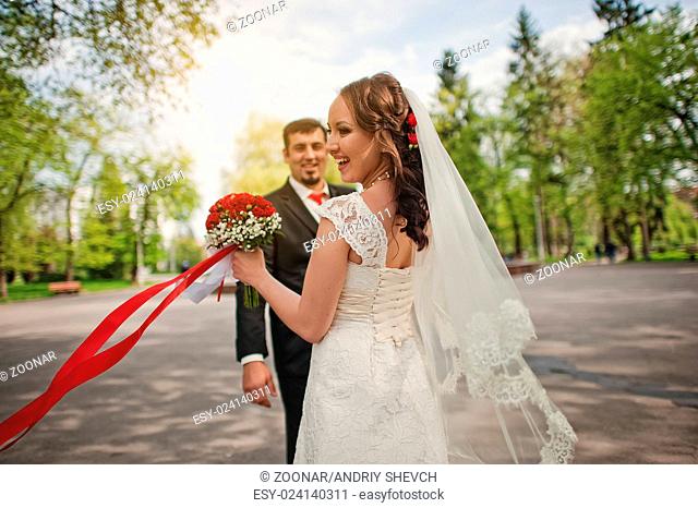 Dancing wedding couple with smiled emotions