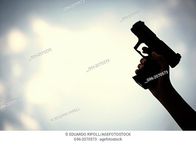 Man holding a pistol