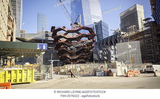 Development in the Hudson Yards neighborhood in New York on Tuesday, October 17, 2017. The Vessel created by Heatherwick Studios is in the center under...
