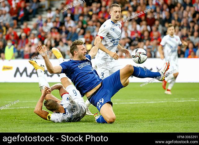 Rakow's Andrzej Niewulis and Gent's Laurent Depoitre fight for the ball during a soccer match between Polish team Rakow Czestochowa and Belgian KAA Gent