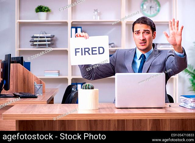 The young male employee being fired from his work