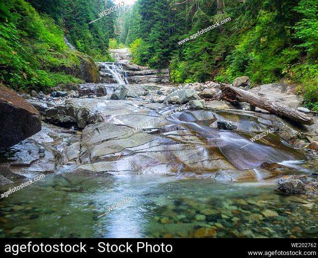 The Denny Creek Trail is extremely popular and for good reason!. A natural waterslide, two good sized waterfalls, lots of old growth forest mixed in with open...