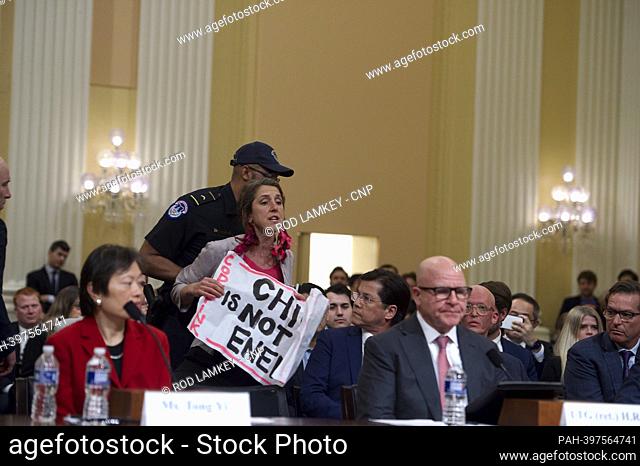 A protestor is removed from the room as Lieutenant General H.R. McMaster (Ret.), Senior Fellow, Hoover Institution, on behalf of Stanford University