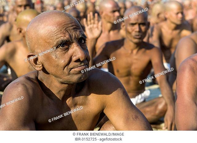 Man joining the initiation of new sadhus, during Kumbha Mela festival