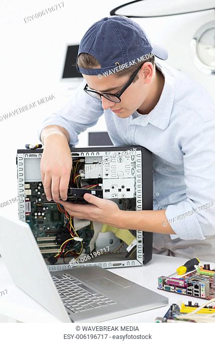 Computer engineer working on broken console