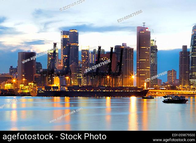 View of Singapore container port at sunset