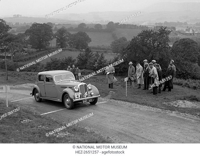 Rover saloon of WJH Davies competing in the South Wales Auto Club Welsh Rally, 1937 Artist: Bill Brunell