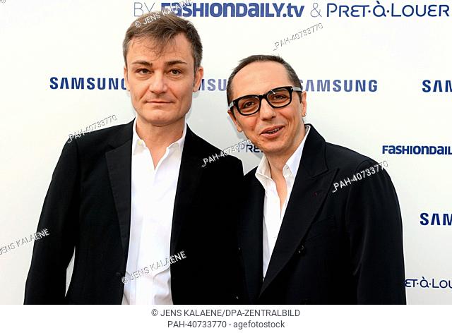 Designers Roberto Rimondi (l) and Tommaso Aquilano at the Samsung Designer Soiree during the Mercedes-Benz Fashion Week in Berlin at gallery Epicentro, Germany